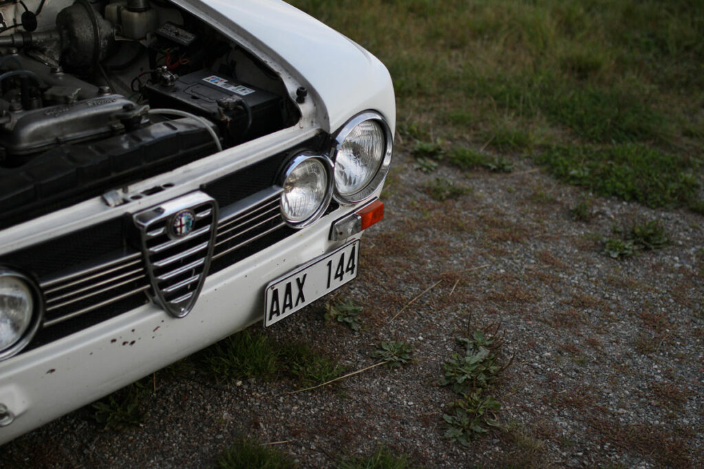 Headlight in modern grill of Alfa Romeo