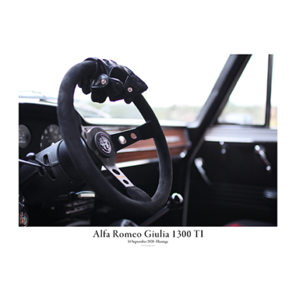 Alfa-Romeo-Giulia-1300-TI-–steering-wheel-with-racing-gloves
