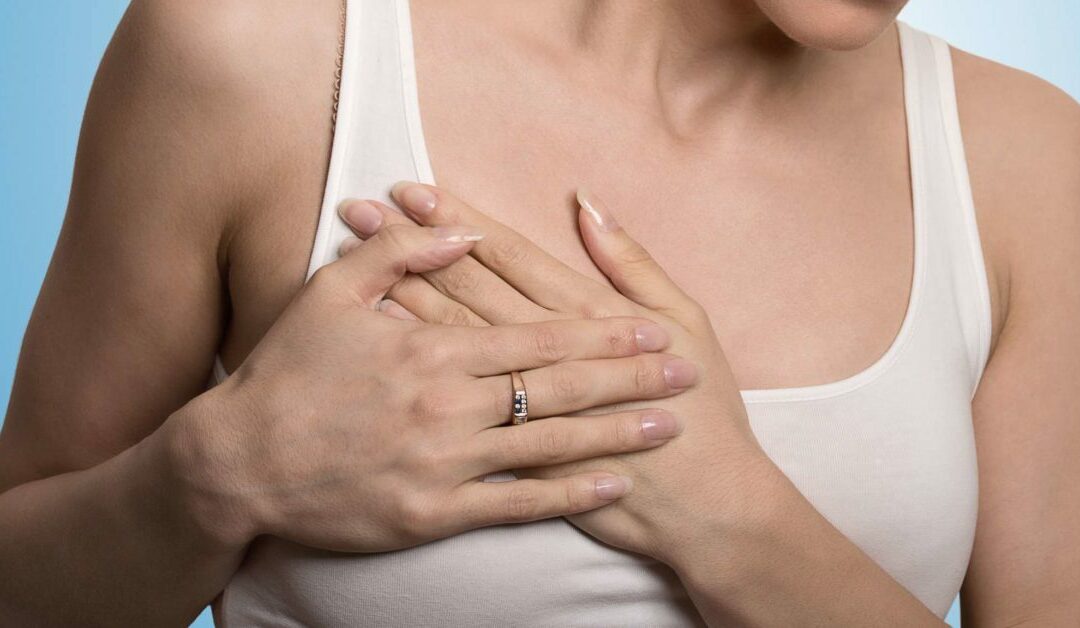 woman having pain in the chest