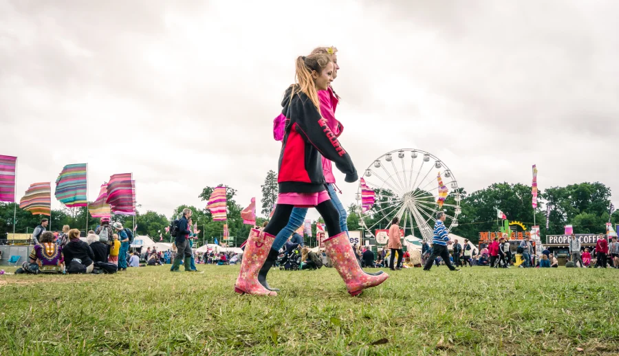 wearing rain boots (wellies) at muddy festival