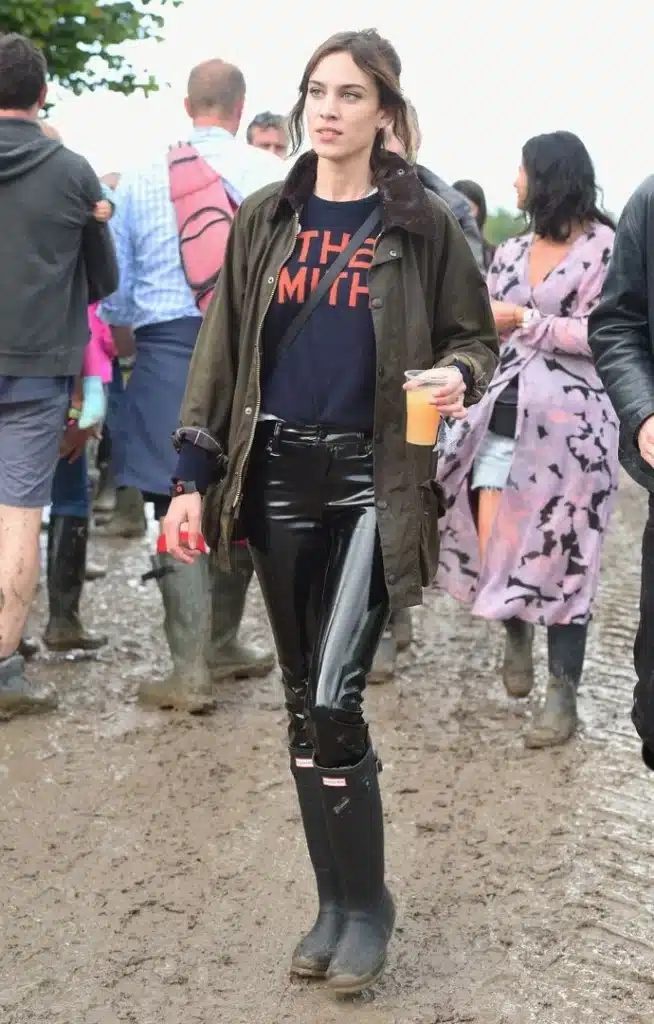 women wearing rain boots at festival