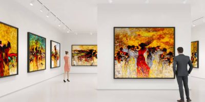 Young couple visits art exhibition and looking at the fine art paintings in a art gallery.
