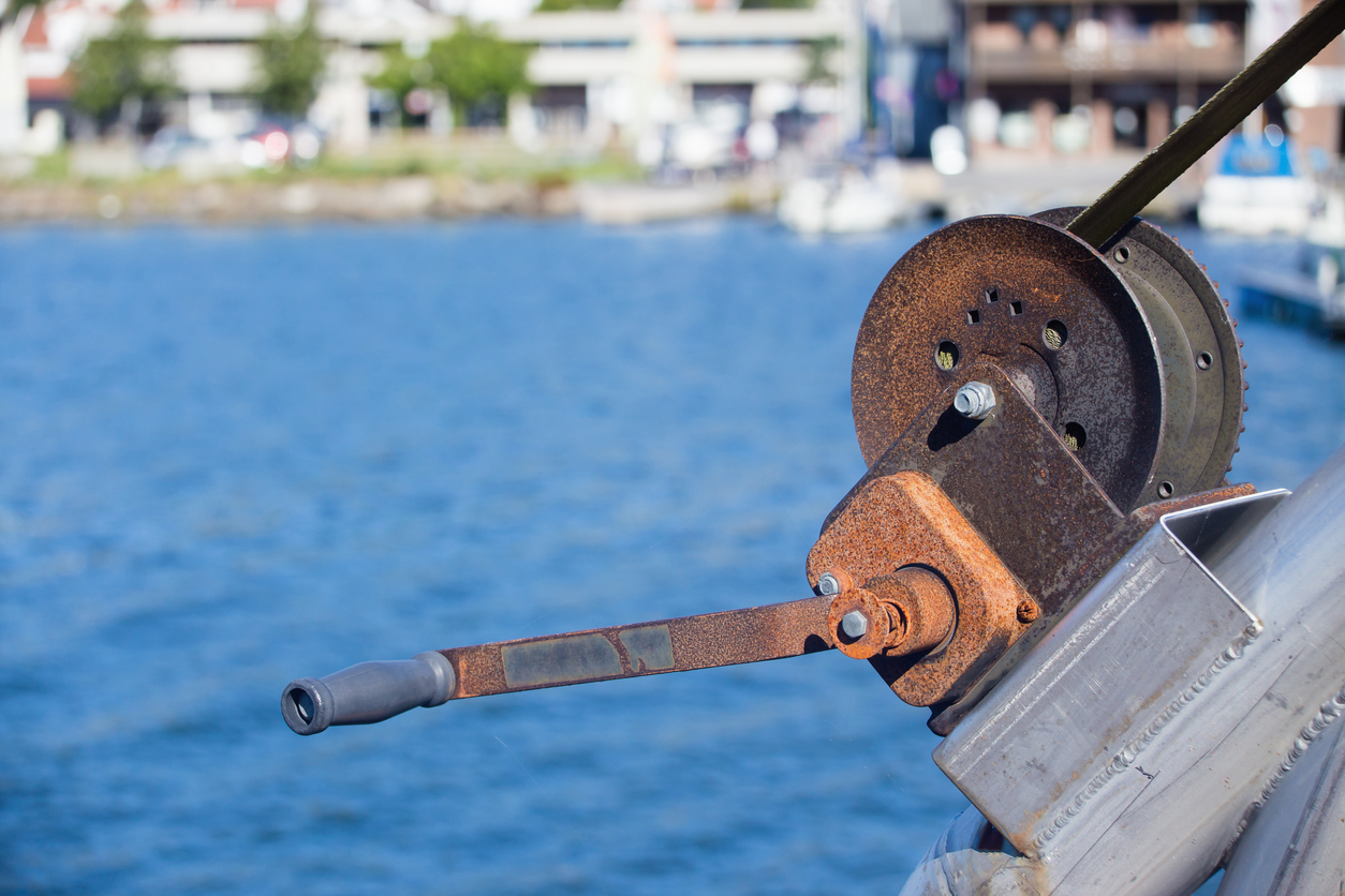 Rusty metallic lifting mechanism in Sandefjord Quay