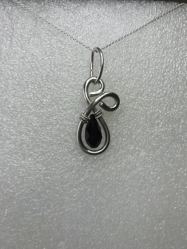 Design Silver Sterling pendant with Swarovski Black teardrop crystal.