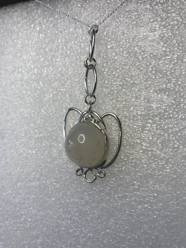 Lotus flower with opaque quartz crystal cabochon stone.