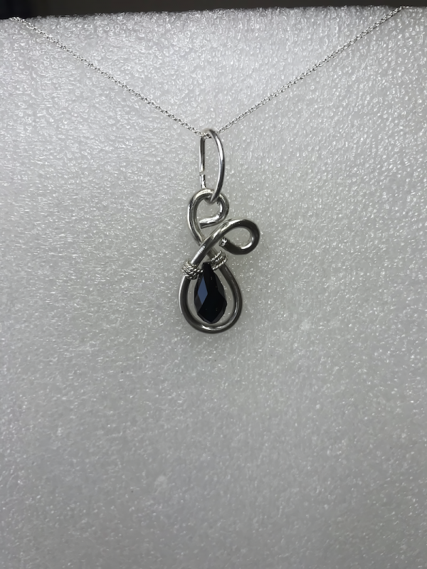 Design Silver Sterling pendant with Swarovski Black teardrop crystal.