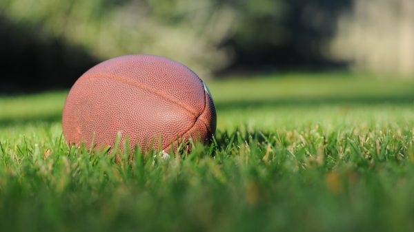 Photo The Best American Football-Themed Songs: A playlist of songs inspired by or referencing American Football.