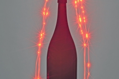 Flaske med rødt lys