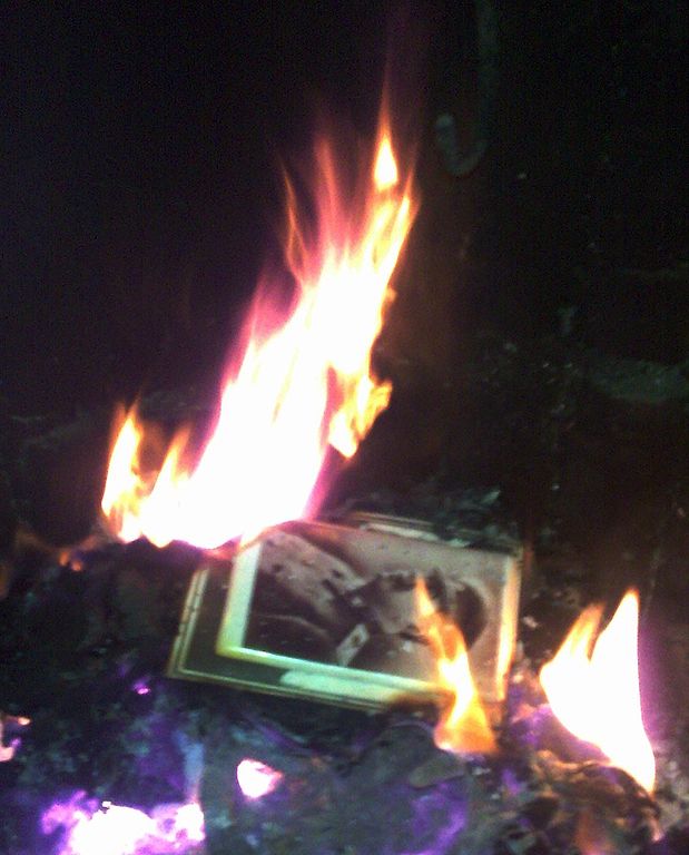 Joseph Stalin's portrait burning in a fireplace in a village in Guria, Georgia, Kober Joseph Stalin's portrait burning in a fireplace in a village in Guria, Georgia, Kober