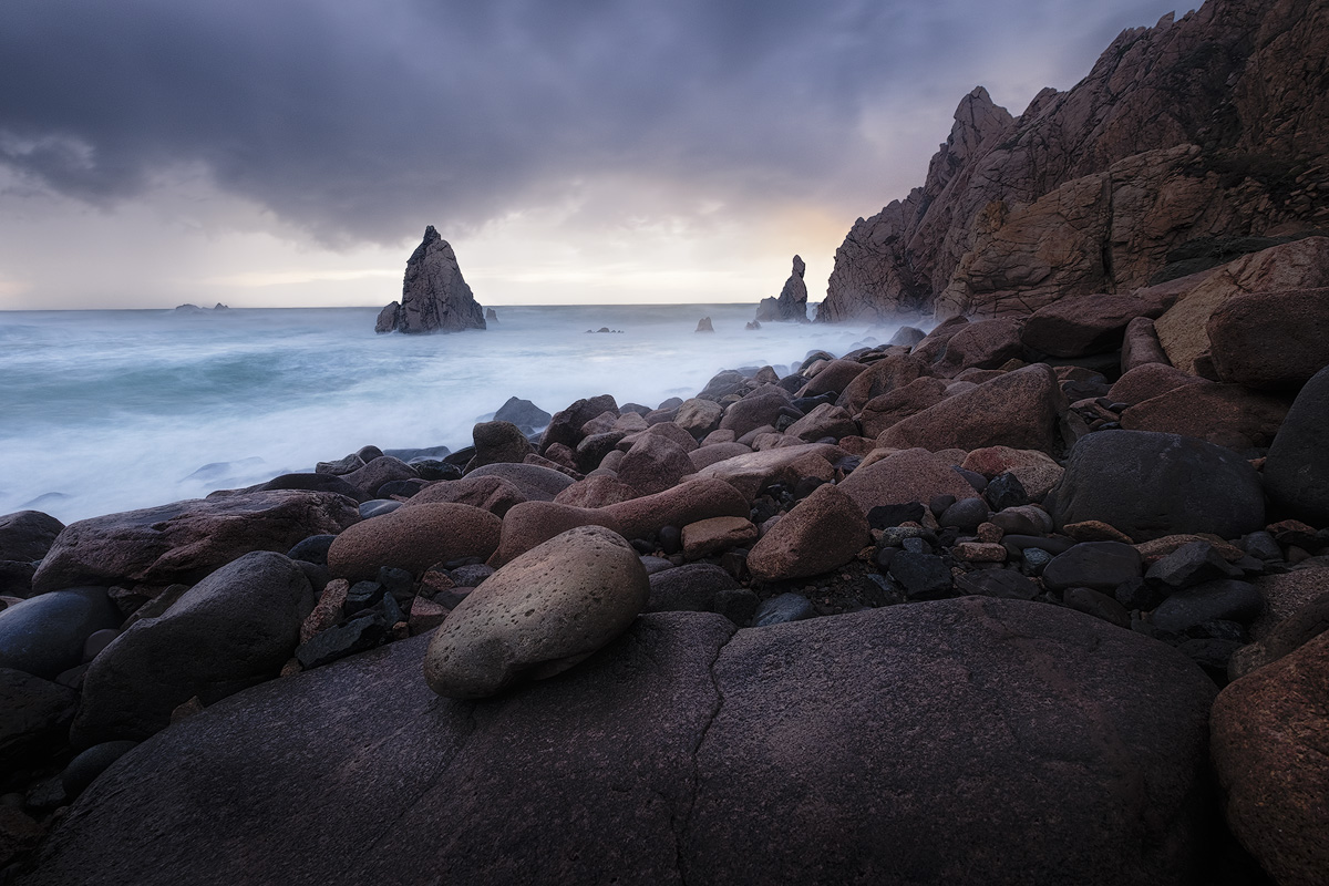 The rocky beach at Praia da Aroeira Fuji X-T1 . Fuji XF10-24mmF4 @ 10mm . f/8 . 2.5" . ISO 200