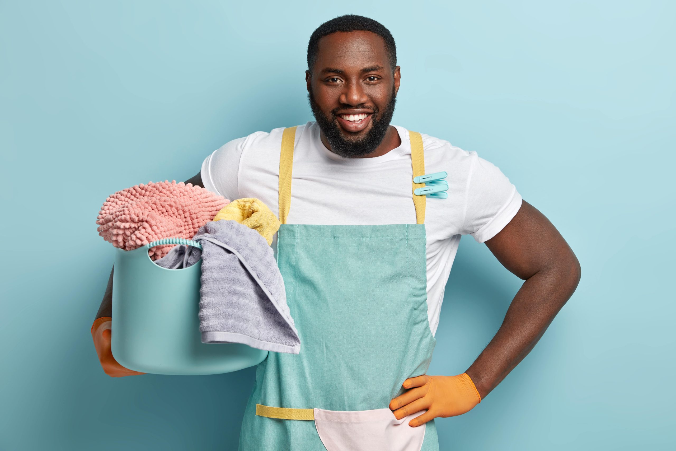 young-african-american-man-doing-laundry-min
