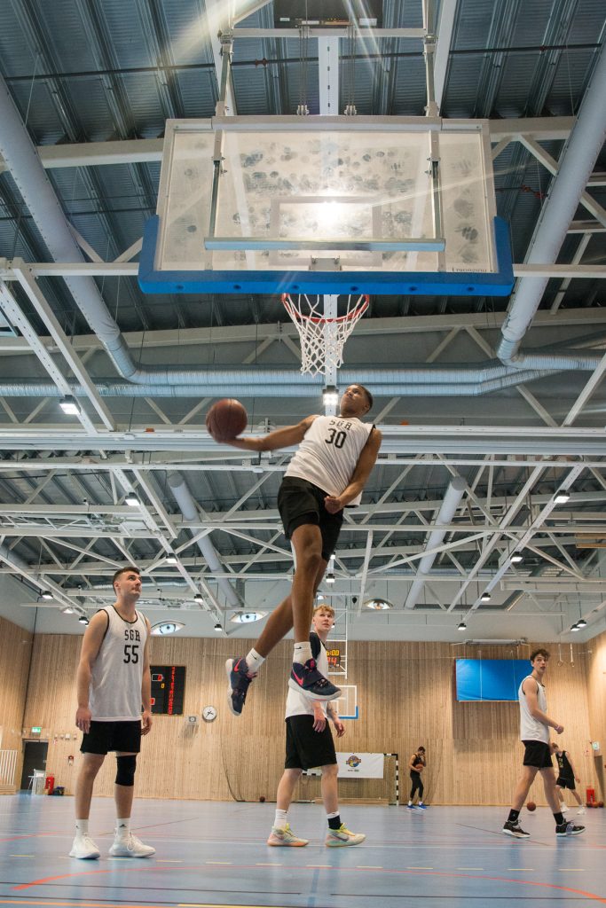 Basketball Player Shooting Hoops