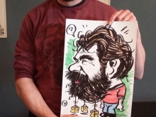 Karikaturist tekent man met baard
