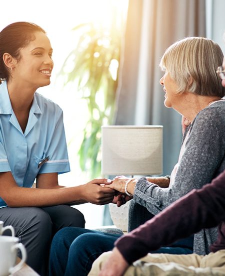 Nurse helping care for couple