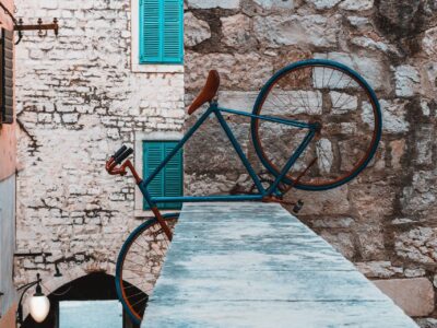 Student bicycle parked on a concrete ledge