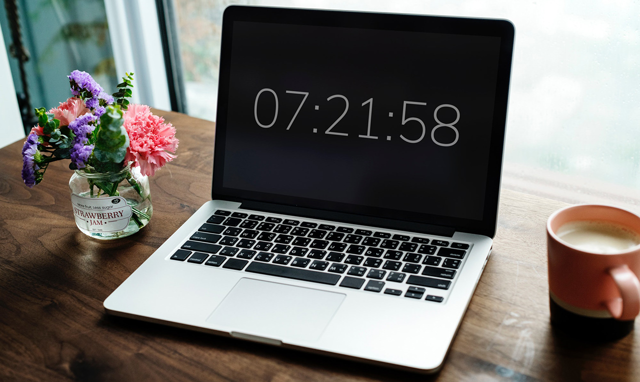 MacBook, flowers and a cup of coffee