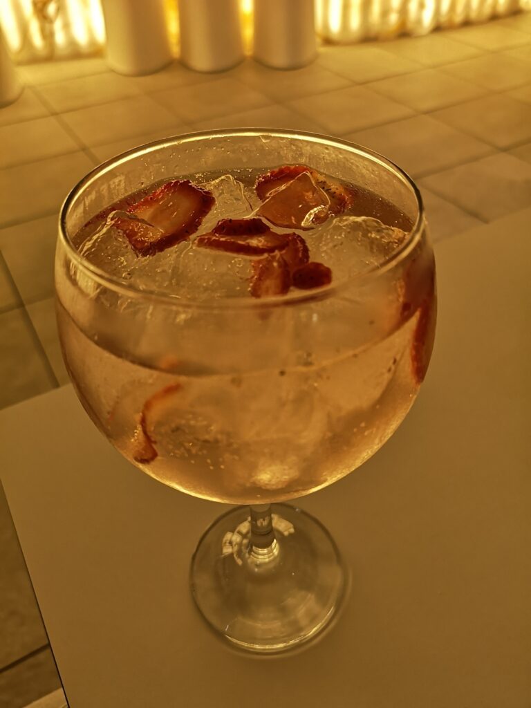 Pink gin, a sundowner at the Gran Hotel Miramar