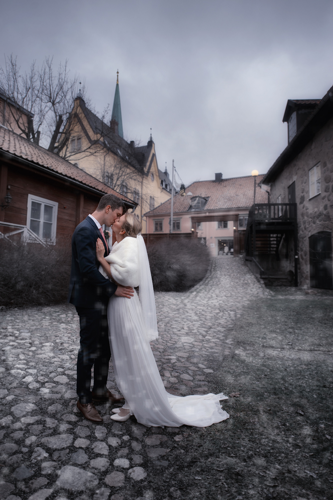 Bröllopsfotografering av vinterbröllop med snö