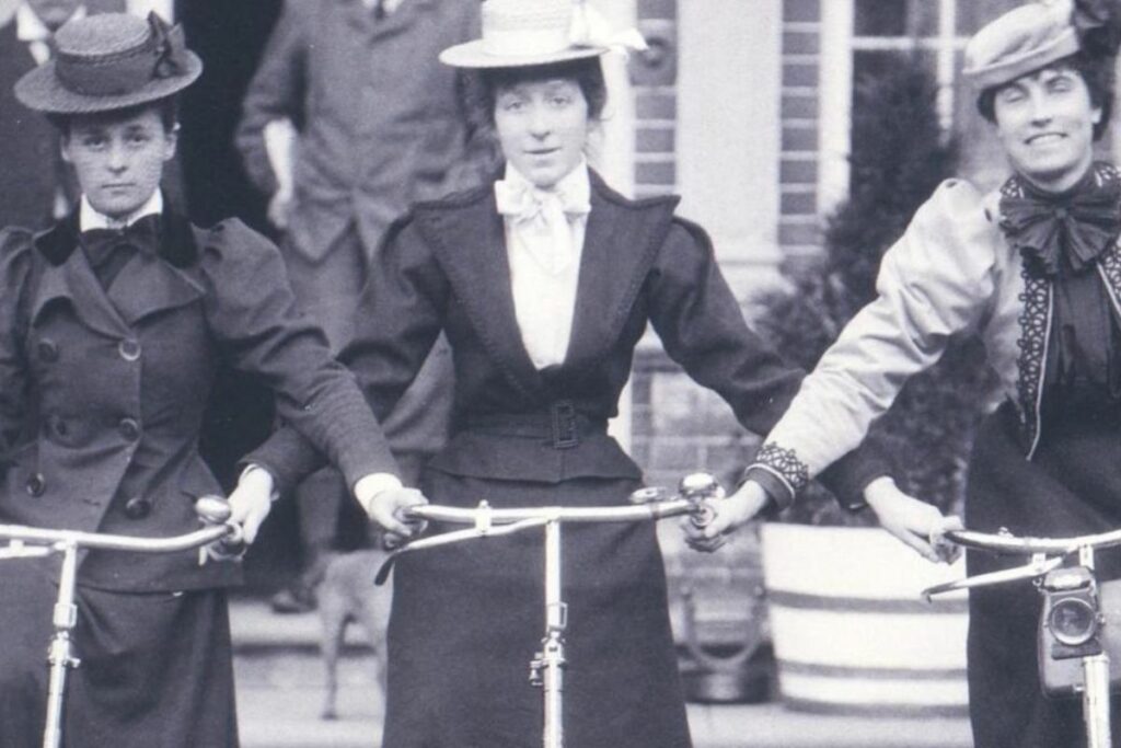 An old image showing three women wearing Black Blazers