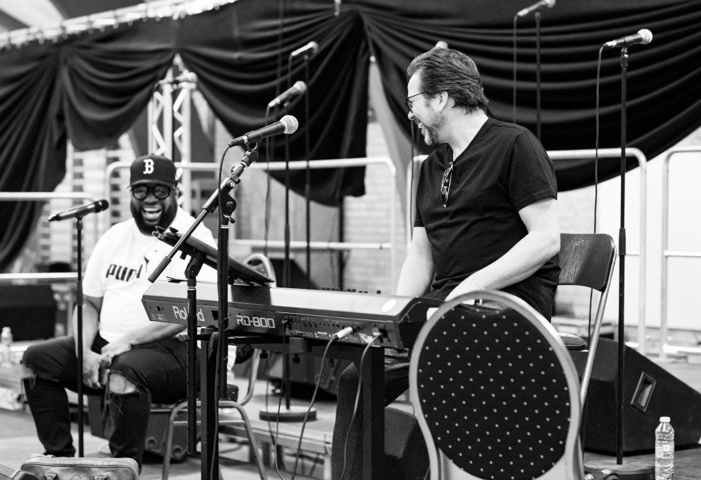 Hezekiah Walker and Hans Christian Jochimsen laugh together during a workshop