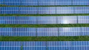 Aerial shot of a solar panel array generating renewable energy in Trenton, Georgia.