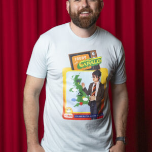 Photo of man against red curtain background. Man has light brown hair. He is wearing a Light blue t-shirt featuring a rectangular weather map of the UK. The weatherman is wearing a brown suit jacket and light blue jeans. He has black hair with a red fringe and is wearing black glasses upside-down. He has a black/dark orange/light orange striped tie and is disinterestedly indicating at the weather map behind him. A navy blue scroll is underneath reading the words 'YOU AND ALL THE SEASONS- Dorset 8degrees C' Above the weather map, an old-fashioned TV is visible with an orange screen. 'Today with Nick Capaldi' is written across it in yellow text and green shadow. 'Today with' is in white lettering.