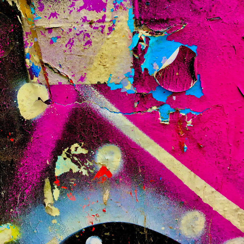 Seven Stars Yard drips with ripped colour and painted layers in a living street art collaboration of accidental narratives