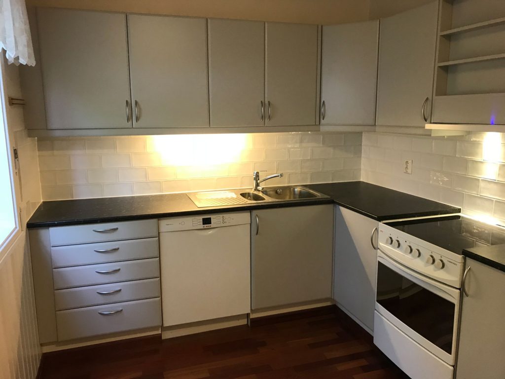 Tear tiles and put new ones over the kitchen counter