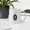 white-glossy-mug-11oz-office-environment-63b6a9a4c9439.jpg