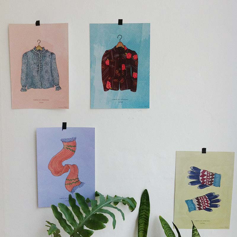 "Objects of Affection" prints pasted on the wall