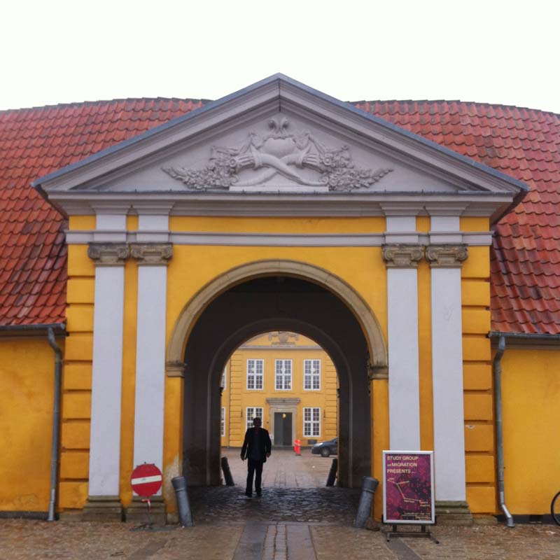 Entrance of Museet for Samtidskunst Roskilde with the event poster of "Study Group on Migration Presents"