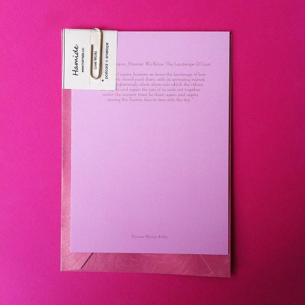Pink postcard featuring "Again and Again" poem by Rainer Maria Rilke
