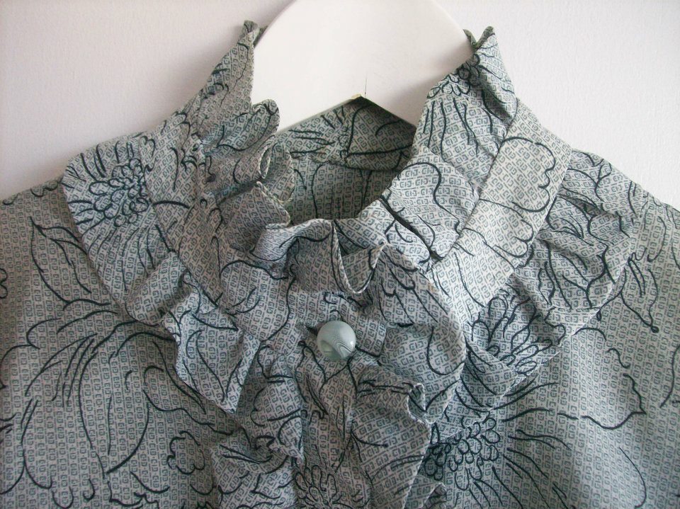 Neckline detail from the grey blouse from Hamide's Originals series