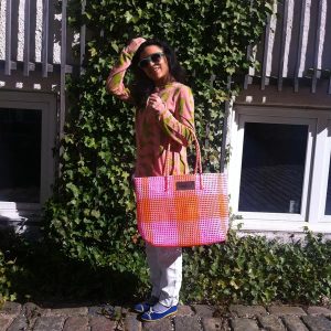 Seyda using the bag by Raintree in rose and orange plaid