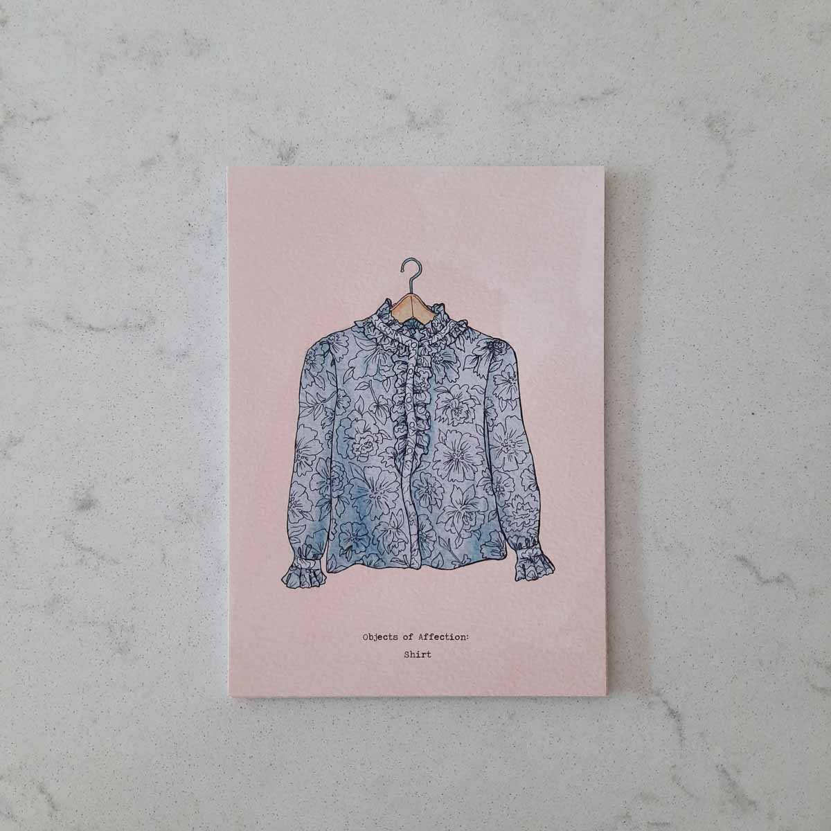 Postcard featuring a handmade shirt designed and made by our honorary founder and mother Hamide