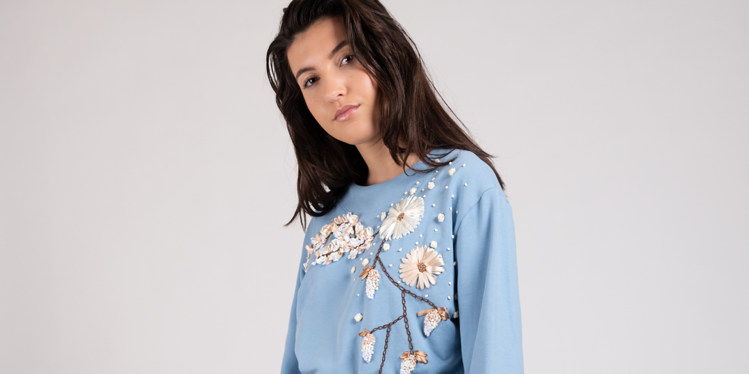 Model wearing hand embroidered flower sweater dust blue Haruco-vert