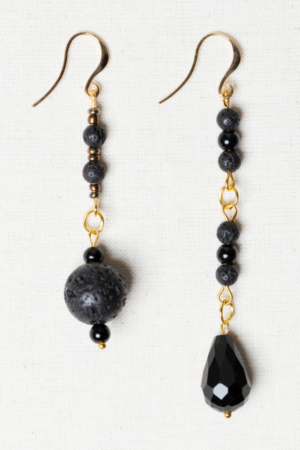 Asymmetrical golden earring set with black lava stones and black glass beads