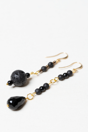 Asymmetrical golden earring set with lava stone and black glass beads