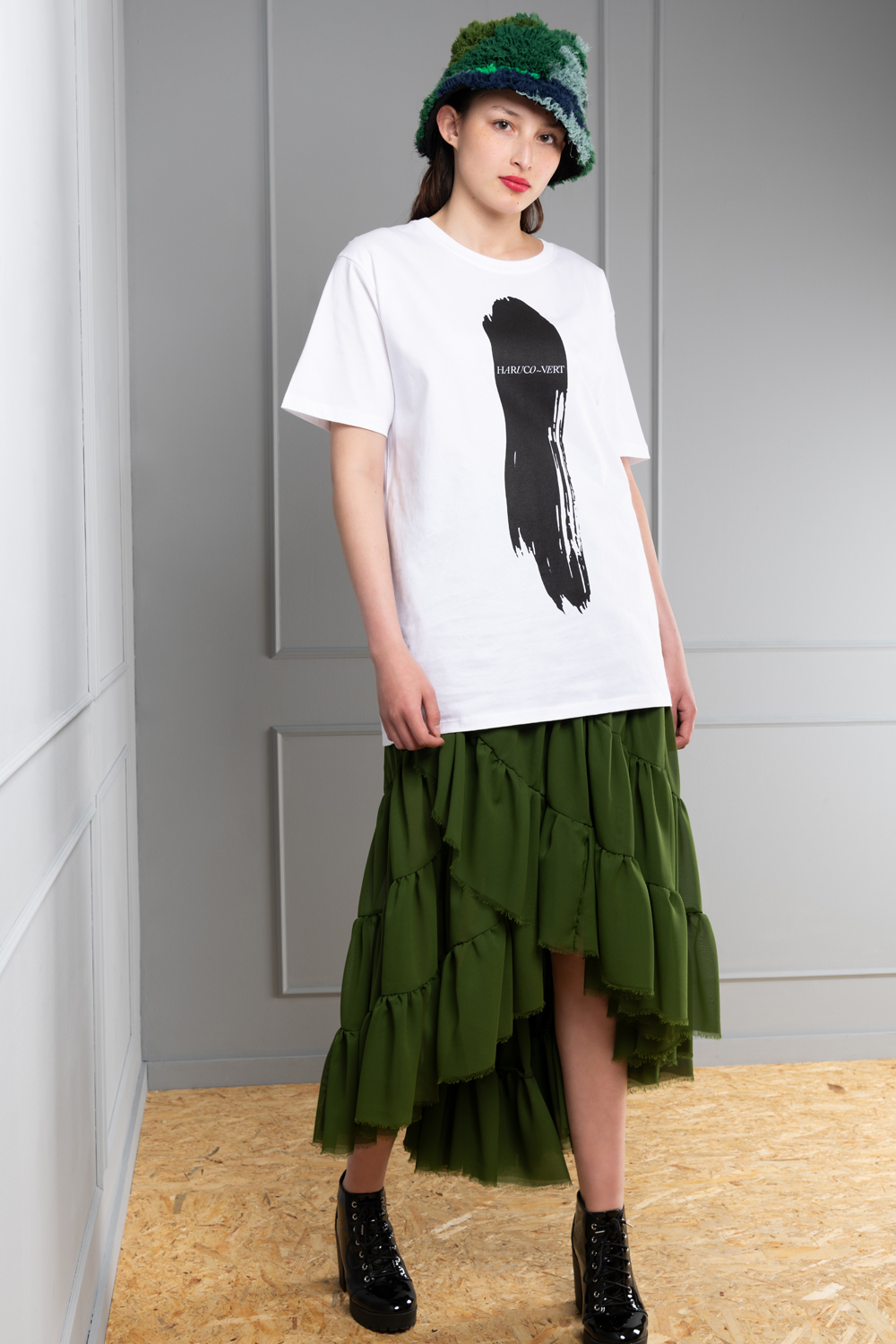 Green paint and white shirt 2025