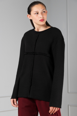black-knit cross sweater