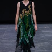 Unisex dress with green ruffles and gold workembroidery