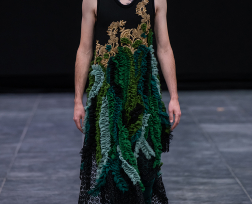 Unisex dress with green ruffles and gold workembroidery