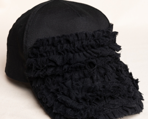 black men's cap with ruffles