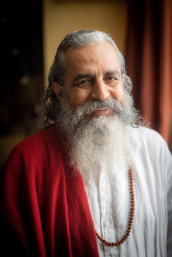 Headshot of Dr. Omanand Guruji a born Yogi, one of the chief disciples of Yugpurush Mahamandleshwar Swami Shri Paramanand Giriji Maharaj.