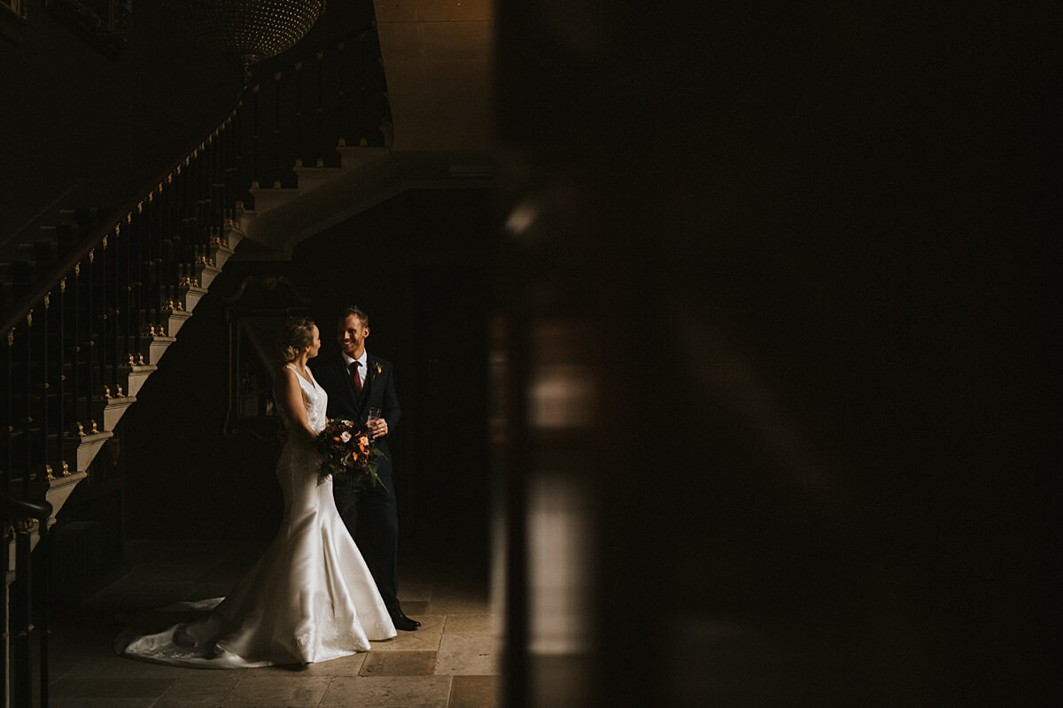 Stubton Hall Stairway Bride and Groom at Stubton Hall