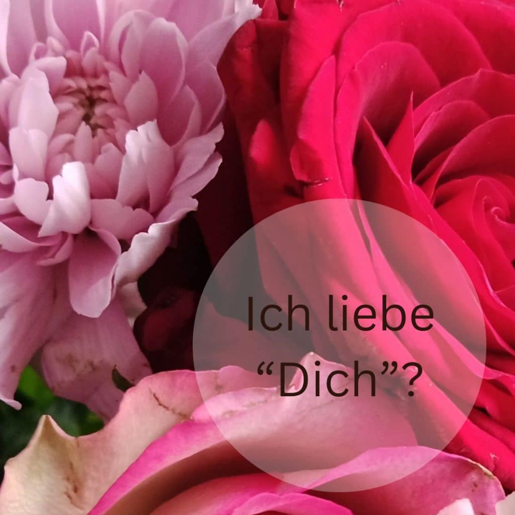 Auf dem Bild sind Blumen zu sehen und der Schriftzug Ich liebe Dich?