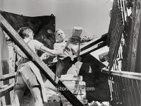 Children clearing rubble 1945