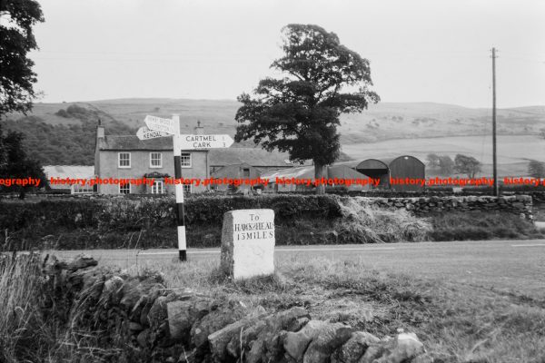 Q003131 Signpost near Cartmel. Cumbria. 1968