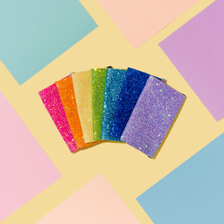 Sparkly colourful product photography and styling for Crown & Glory by Marianne Taylor.
