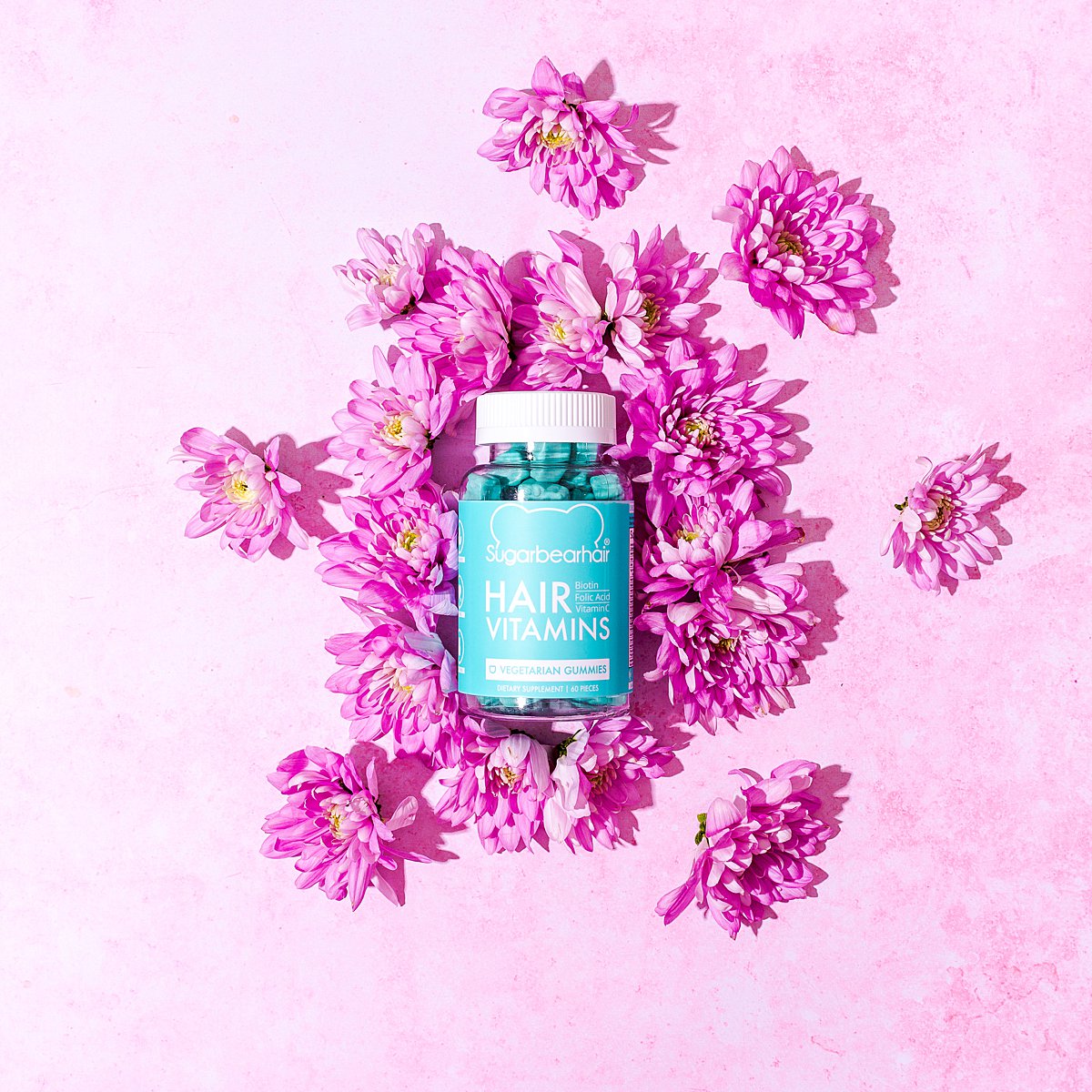 Cute colourful content creation for SugarBearHair vitamin supplements. Styled product stills photography by Marianne Taylor.